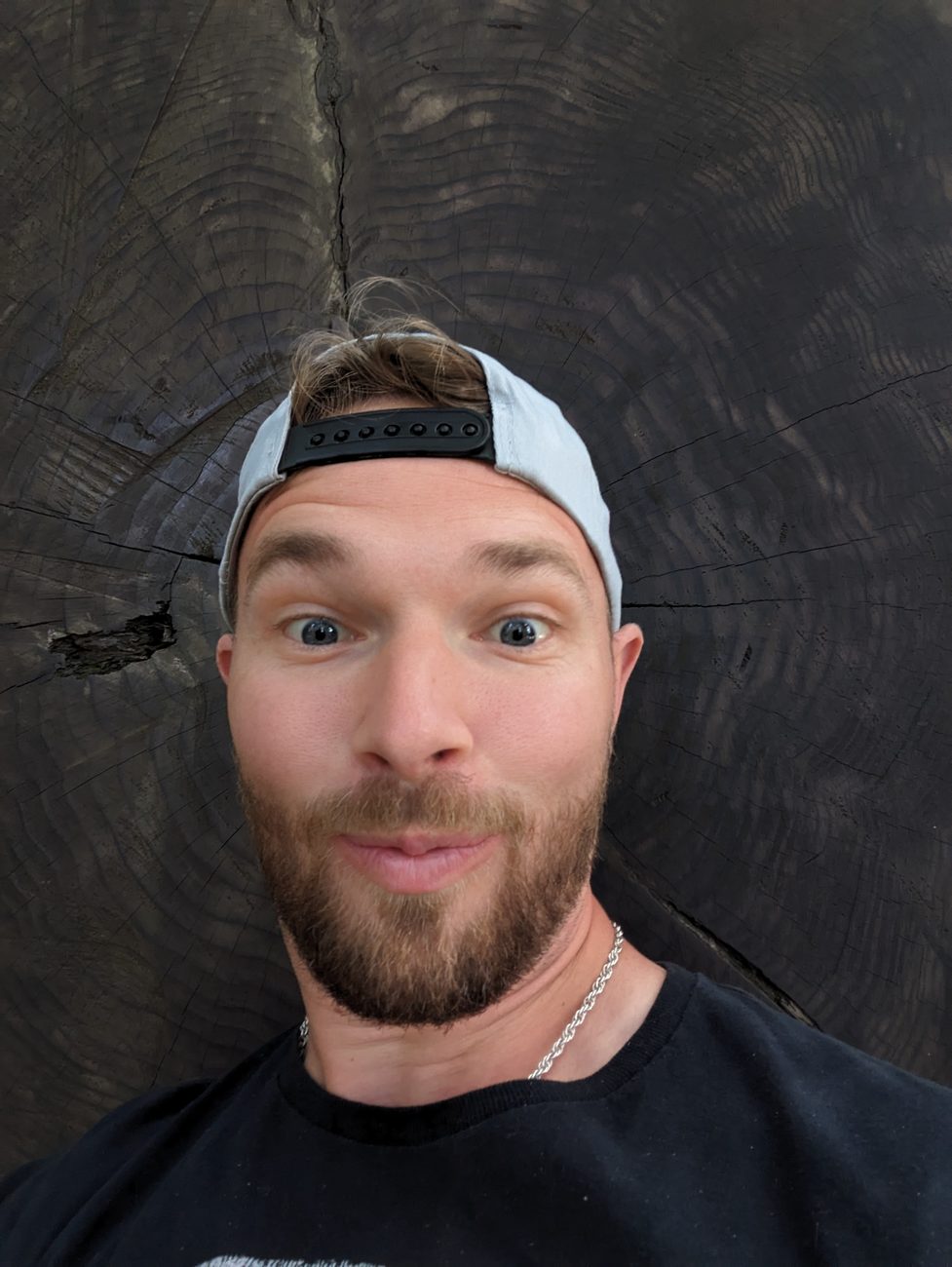 Ben in front of a giant log cross-section
